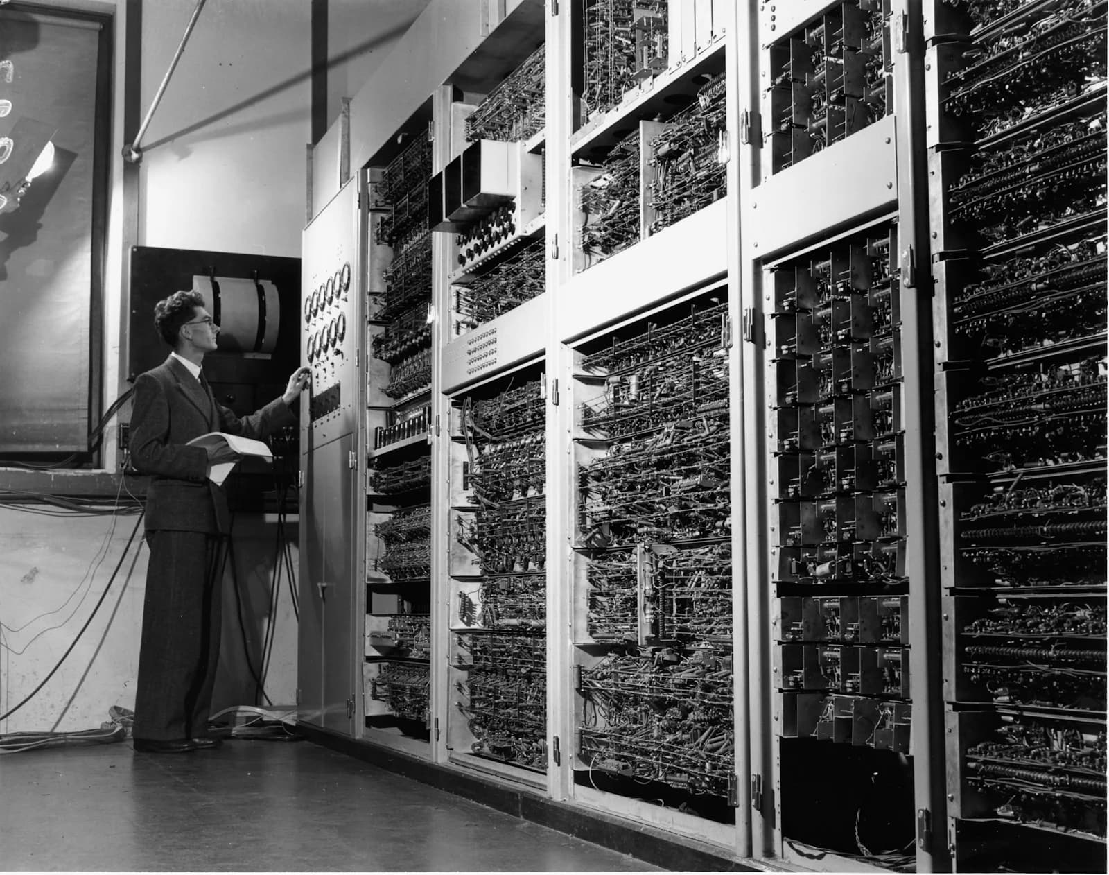 An engineer at a large early computer system