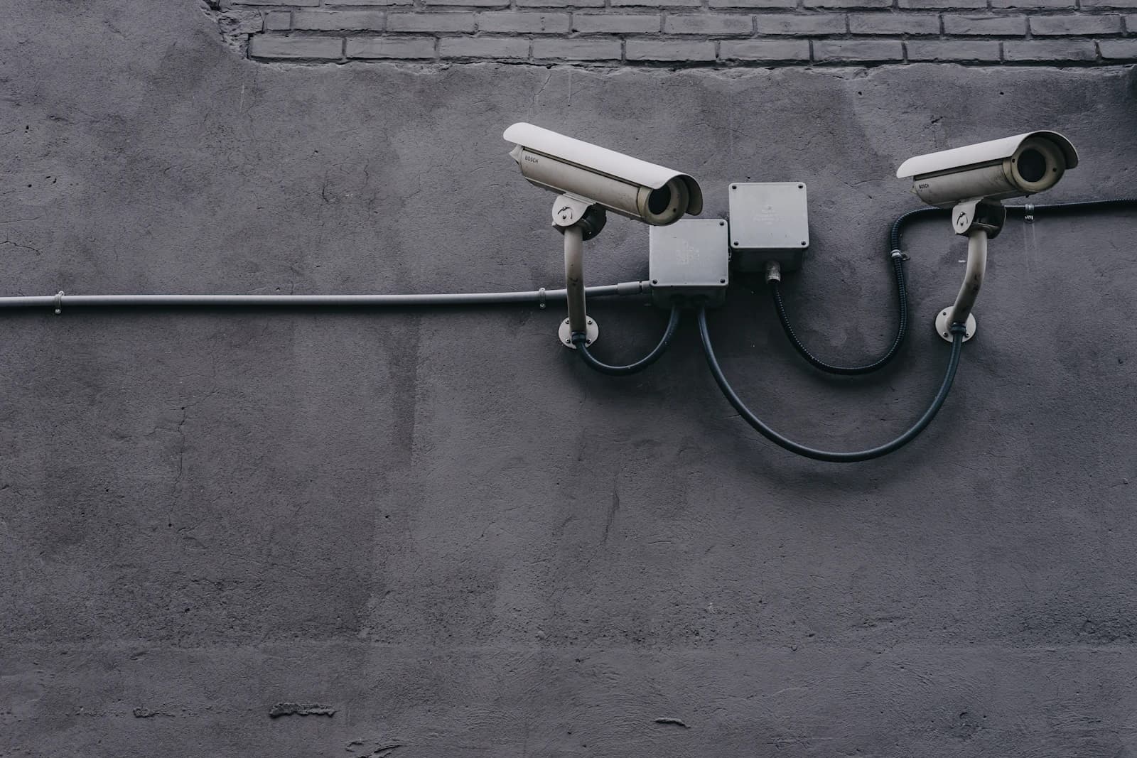 Cameras mounted on a concrete wall