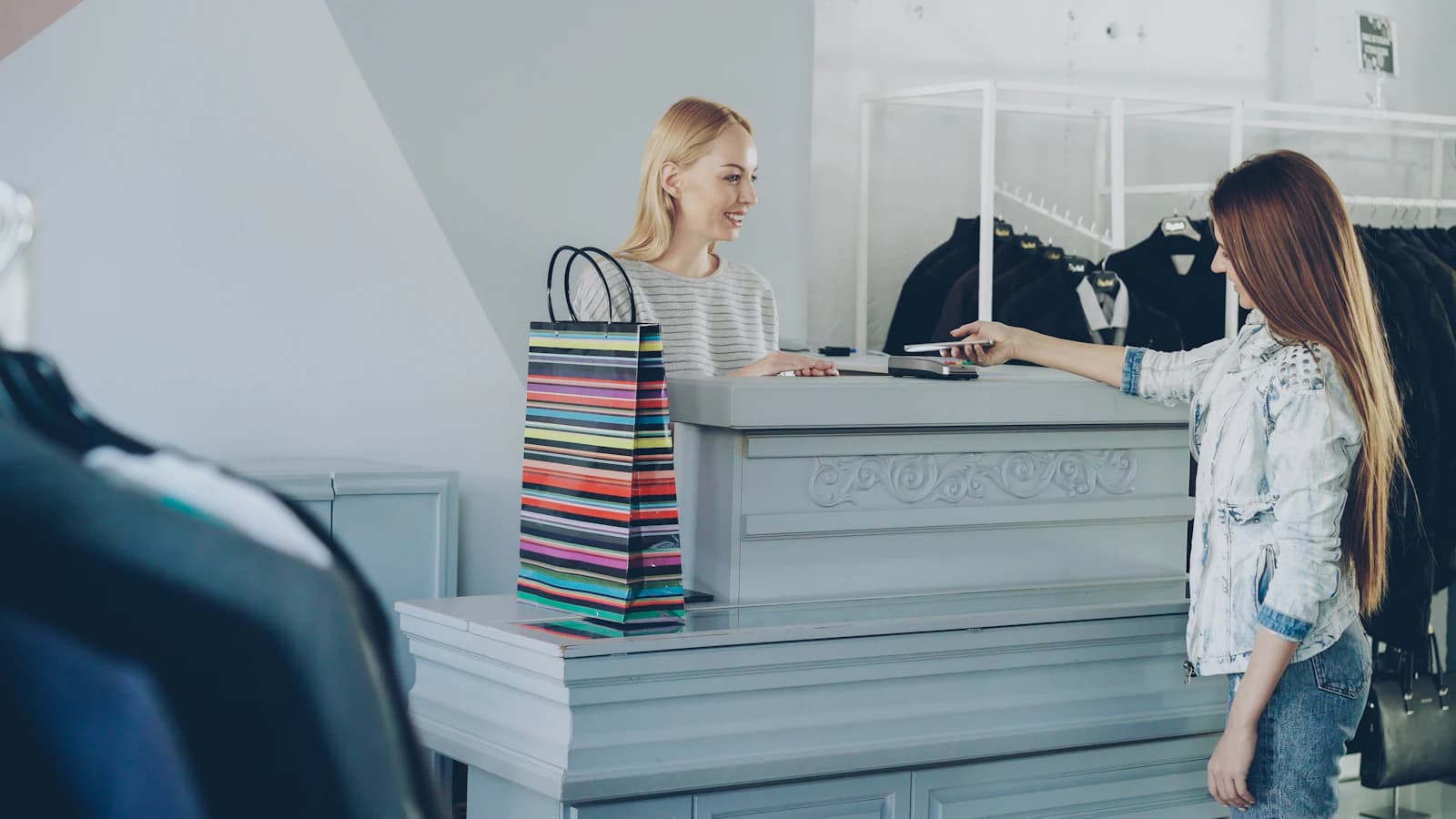 A customer being served at a shop counter